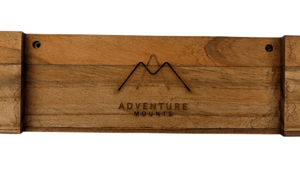 Close up of the raw wood and Trailwood stain on the Powder Chaser premium wood snowboard mount product by Adventure Mounts.